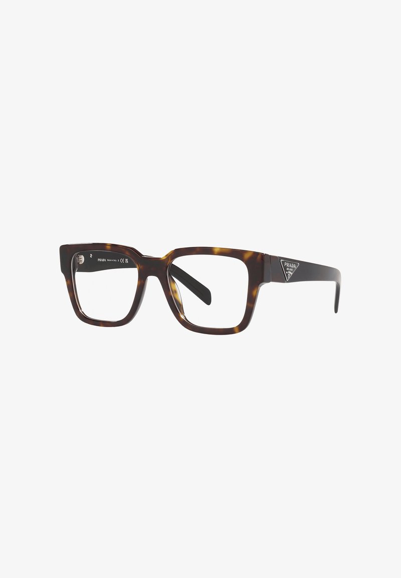 Occhiali rettangolari tartarugati con lenti trasparenti, caratterizzati da sottili accenti dorati e un logo sulla stanghetta.