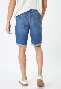 Koton Farkkushortsit - blue denim