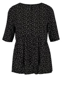 Top nero a maniche corte con scollatura a girocollo, caratterizzato da un motivo a cuori bianchi, vita arricciata e vestibilità rilassata.