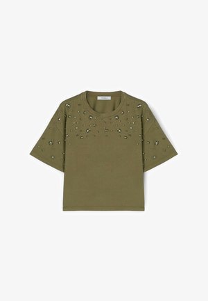 Olive green short-sleeve top with round neckline, adorned with scattered small and medium irregular metallic studs on chest and sleeves.