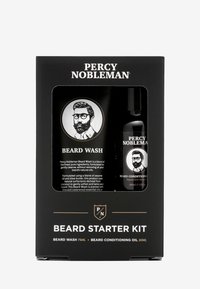 Baard starter kit met zwarte verpakking bevat een uitsparing die een 75 ml baardwas en 30 ml verzorgende olie toont, geaccentueerd met gouden tekst.