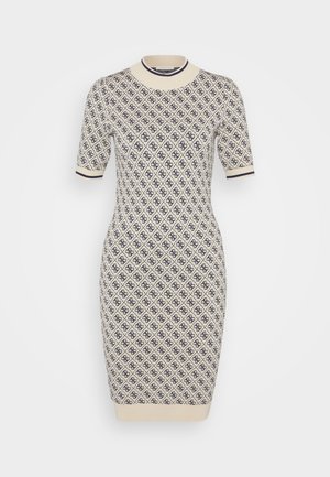 Knit dress in cream with a navy diamond pattern. Features a round neckline and short sleeves with contrasting trim at armholes and hem.