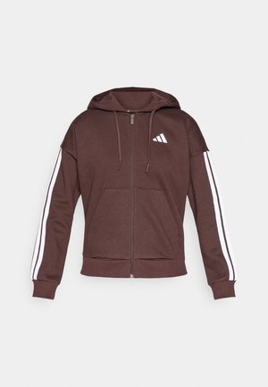 Brown zip-up hoodie made of soft fabric, featuring a large front pocket, white side stripes, and a small white logo on the chest.