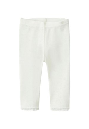 Hvide strikkede leggings med et struktureret mønster, blødt stof og en blondekant nederst på benene. Har elastik i taljen.