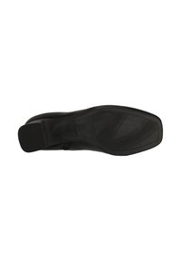 Svart skosula med en slät design, en texturerad yta och horisontella spår för grepp. Märket "Clarks" synligt.