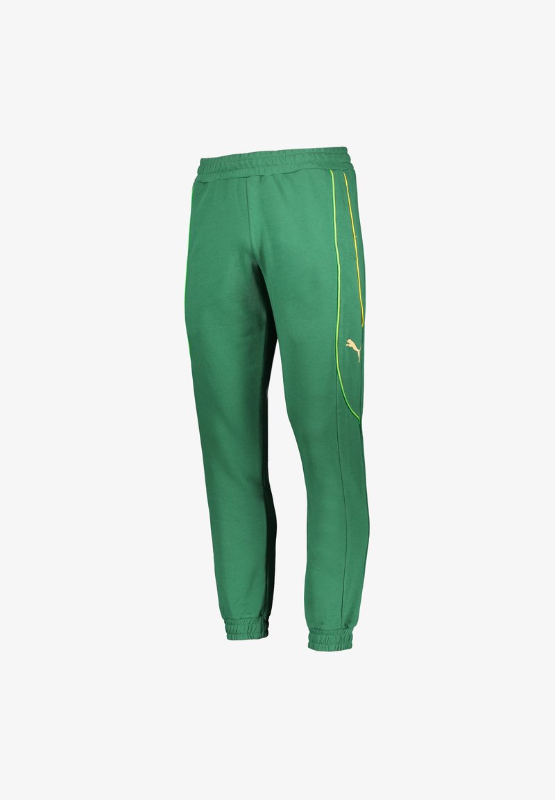 Groene katoenen joggers met een elastische tailleband en boorden. Voorzien van gele zijstrepen en een klein gouden logo op het linkerbeen.