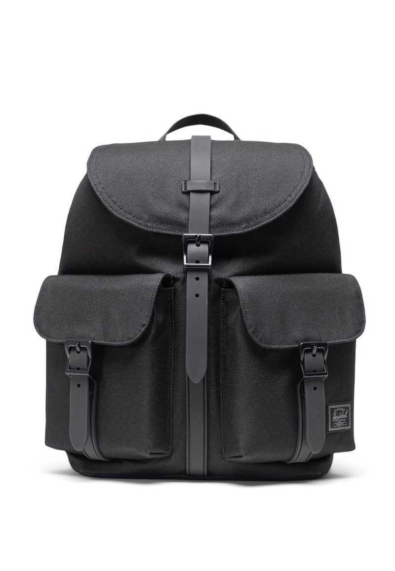 Black fabric backpack with a flap closure, featuring two front pockets with straps, a top handle, and a rectangular shape.