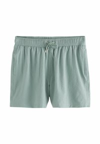 Pantaloni corti verde chiaro realizzati in tessuto testurizzato, con vita elastica e cordoncino e tasche laterali.