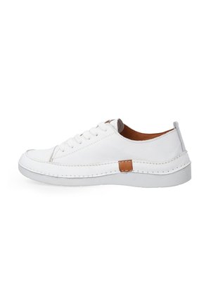 White lace-up shoe with a smooth leather upper, subtle brown accent patch, contrasting white stitching, and a rubber sole.