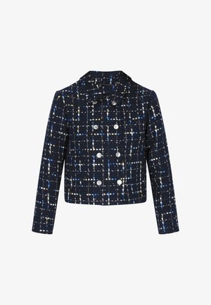 Tamsiai mėlynas audinio švarkas su tinklo raštu mėlynos, baltos ir pastelinių atspalvių spalvų kombinacijomis. Dvigubai užsegamas su dideliais sidabriniais mygtukais ir apykakle.