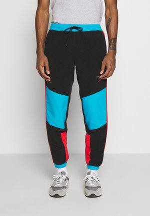Pantalones deportivos - black