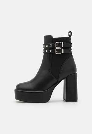 Kovbojská/motorkárska členková čižma - black