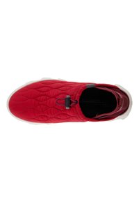 Red quilted slip-on shoe with a textured upper, featuring a black strap accent and a white rubber sole design for grip.
