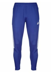 Blauwe sportbroek van gladde stof, met drie witte strepen langs de zijkanten, een aansluitende pasvorm en een elastische tailleband.