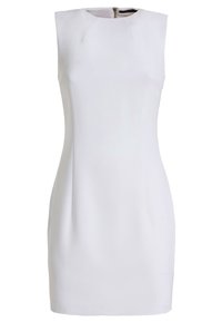 Ærmeløs hvid kjole med rund halsudskæring, tætsiddende silhuet og dart sømme. Har en skjult lynlås bagpå til lukning.