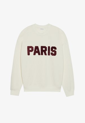 Cremefarvet sweatshirt med rund halsudskæring, udstyret med store burgunderrøde "PARIS" bogstaver syet på forsiden. Blød tekstur, afslappet pasform.