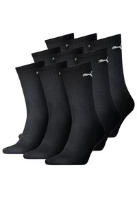 Schwarze Crew-Socken aus geripptem Material, mit einem weißen Logo an der Seite. Set aus sechs Paaren mit einheitlichem Design und klassischer Form.