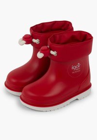 Botas de lluvia rojas de goma con un acabado suave, suela blanca, parte superior elástica y cordones decorativos blancos. Presenta un logo en el lateral.