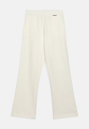 Weiße, elastische Bundhose mit zwei seitlichen Taschen. Weicher Stoff, ausgestelltes Design und genähte Säume für einen glatten Abschluss. Keine sichtbaren Muster.