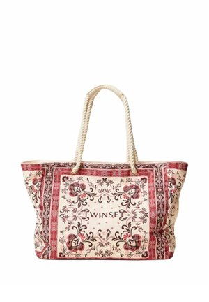 Borsa tote beige con motivi floreali rosa, manici a corda e scritta "TWINSET" al centro di una cornice decorativa.