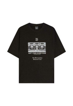 Črna majica s kratkimi rokavi z belim odtisom fasade Metropolitanskega muzeja umetnosti in napisom »Umetnost za vse« na sprednji sredini.
