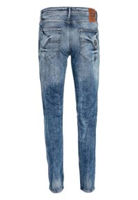 Blauwe denim jeans met een vervaagde afwerking, voorzien van een rechte pijp, twee achterzakken met decoratieve stiksels en een leren merkpatch op de tailleband.