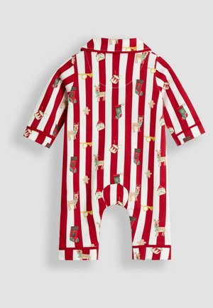 Rot-weiß gestreifter Pyjama-Anzug mit verspielten Feiertagsmustern, darunter Rentiere, Strümpfe und Lebkuchen, hergestellt aus weichem Stoff.