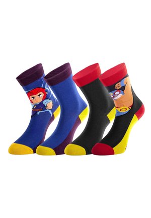 Quatre chaussettes montantes colorées avec des motifs de super-héros en dessin animé, présentant des accents rouges, bleus, noirs, jaunes et violets.