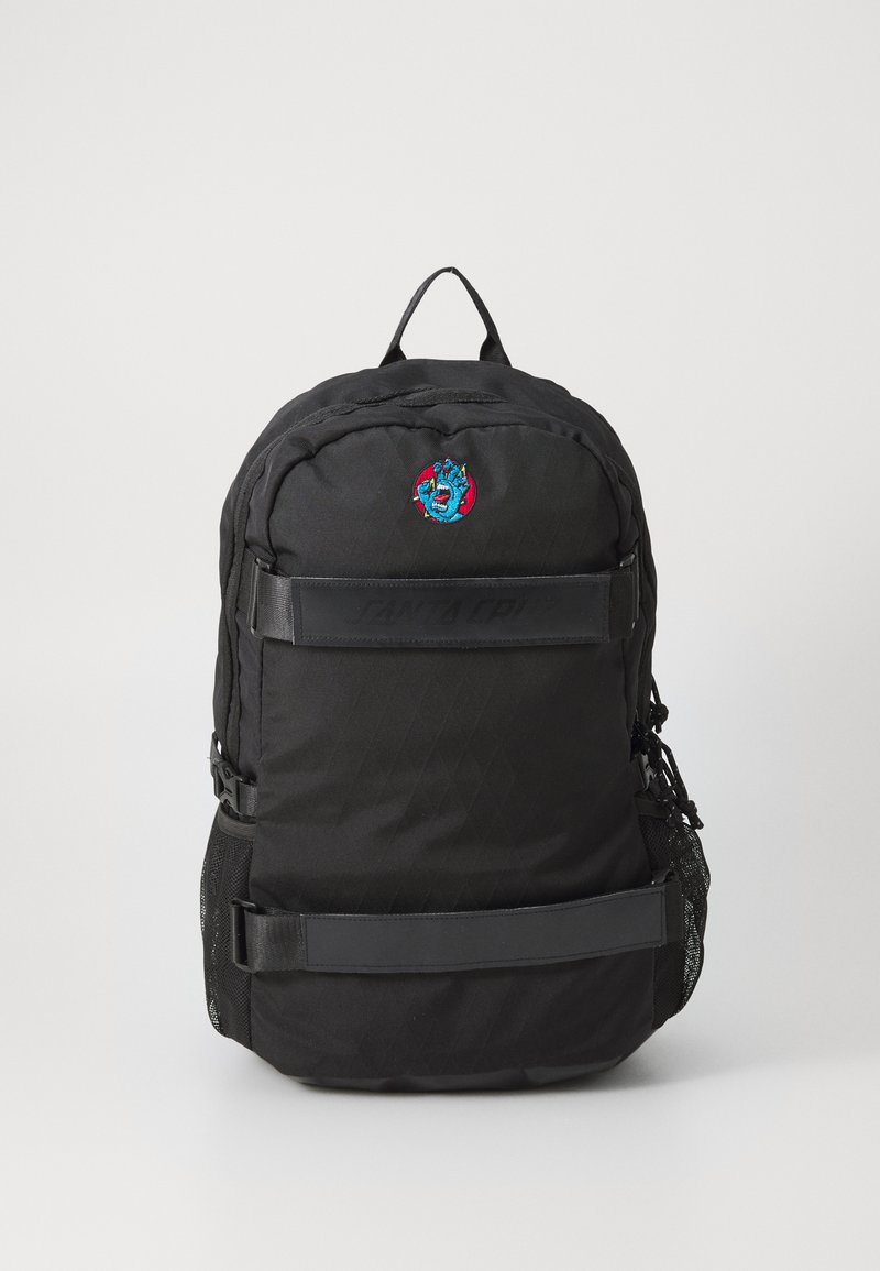 Black backpack with quilted texture, adjustable straps, and an embroidered graphic on the front. Features side mesh pockets and branded straps.