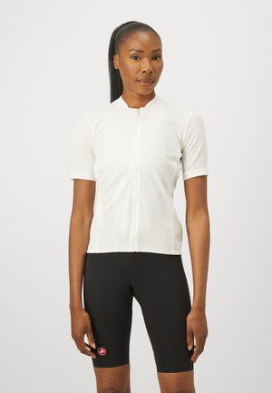 White short-sleeve cycling jersey with a full front zipper and a slim fit. Paired with black cycling shorts featuring a logo. Smooth texture.