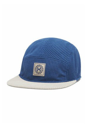 Blauwe gestructureerde stoffen pet met beige klep en vierkante logopatch aan de voorkant met een cirkelvormig ontwerp en een "H" in het midden.