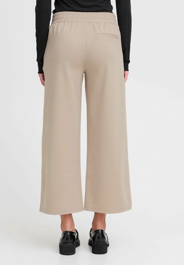 KATE SUS WIDE - Trousers - string4