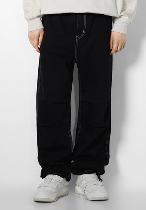 PARACHUTE - Straight leg jeans - black