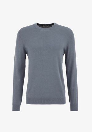 Kék kötött pulóver hosszú ujjakkal, kerek nyakkivágással, bordázott mandzsettával és aljjal. Simább textúra, egyszerű dizájn.