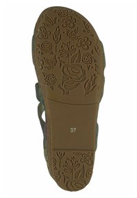 Suola di scarpa in gomma marrone con motivi floreali e di uccelli, con un tacco circolare e misura contrassegnata come 37.