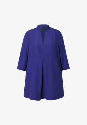 Lila Tunika mit hohem Kragen und Schlüssel-ausschnitt, ¾-langen Ärmeln und lockerer Passform. Hergestellt aus glattem Stoff mit dezenten Stickdetails.