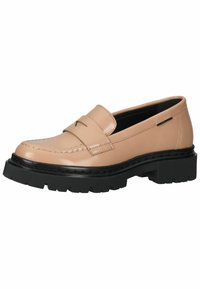 Beige krāsas ādas loafers ar melnu masīvu zoli, ar šūtu purngalu un dekoratīvu jostu pāri augšai. Gluda virsmas tekstūra.