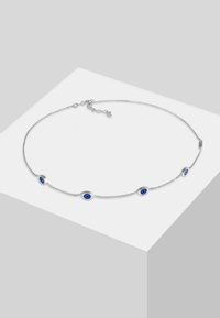 Sølv kædedesign med fem blå øjeformede charms, med en glat finish og justerbar lås.