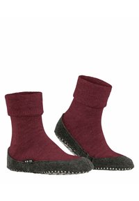 Burgundowe wełniane skarpetki z grubym zwijanym mankietem, szary filcowy spód z białymi punktami przeciwpoślizgowymi oraz miękkim teksturowanym materiałem.