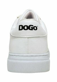 White sneaker with a smooth leather upper, flat rubber sole, and black "DOGO" logo on the heel. Features a padded collar and subtle seam details.