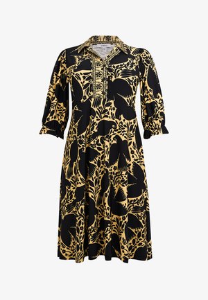 Sort og beige knælængde kjole med fugle- og blomsterprint, 3/4 pufærmer og en krave med knapdetalje.