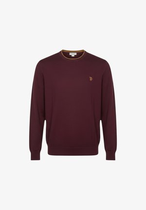Maglione bordeaux lavorato a maglia con scollo rotondo, polsini e orlo a costine. Presenta un piccolo logo ricamato sul petto a sinistra, rifinito con bordature marroni.