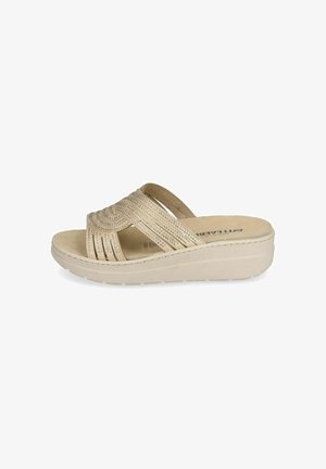 Sandalo beige con zeppa, cinturini decorativi traforati e soletta imbottita su sfondo bianco.