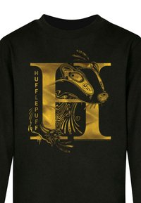 Musta huppari, jossa on kultainen Hufflepuff-muotoilu, jossa on majava, monimutkaisia kuvioita ja sana "HUFFLEPUFF" esitettynä näkyvästi.