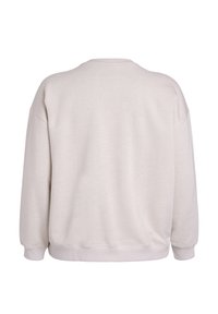 Svetlo béžová oversize mikina s okrúhlym výstrihom, rebrovanými manžetami a spodným lemom. Vyrobená z mäkkej, štruktúrovanej textílie. Zadný pohľad bez grafiky.