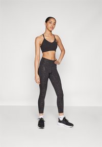 Puma INTERGALACTIC 7/8 - Leggingek - black