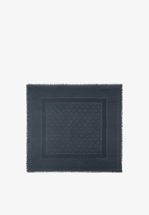 Mørkeblå firkantet tørklæde med subtilt blomsterprint, kantet design, frynser langs kanterne og teksten "kate spade NEW YORK" på den ene side.