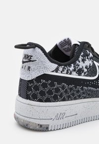 Nike Sportswear AF1 CRATER FLYKNIT NN BG UNISEX - Sneakers - black/white/pure platinum/wolf grey