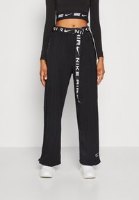 Nike Sportswear Tygbyxor - black