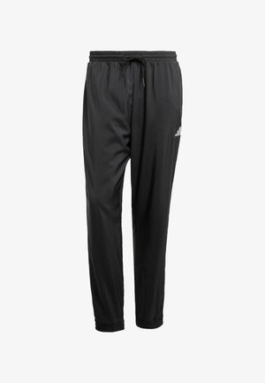 Pantaloni sportivi neri con vita elasticizzata, cordino, caviglie rifinite e un piccolo logo bianco sulla coscia destra.